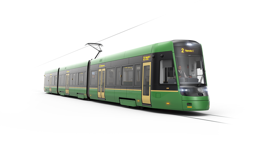Grön spårvagn som kommer att finnas i Uppsala